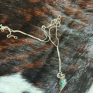 Elegant Silver Necklace with Turquoise Bolt Pendant